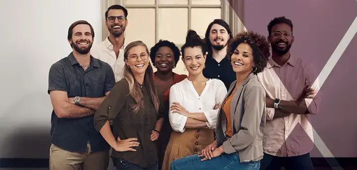Group of professionals smiling at the camera. 