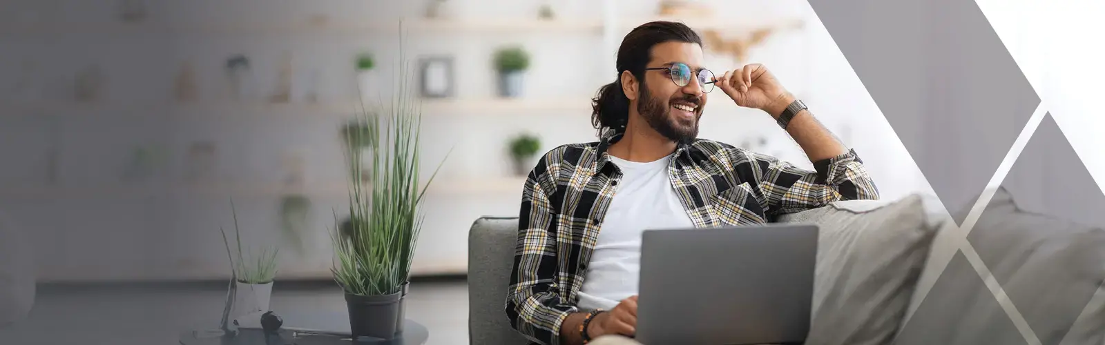 Happy student working using laptop 