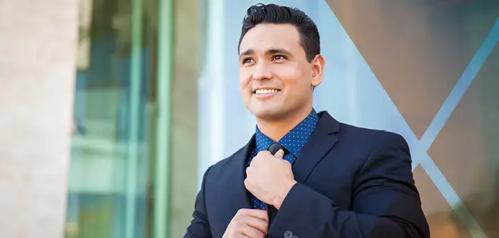 Business professional tightening necktie