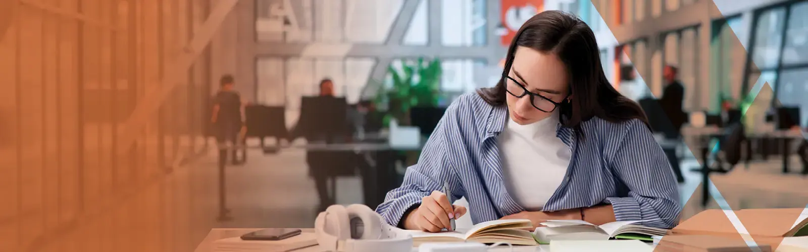 Woman with glasses studying.