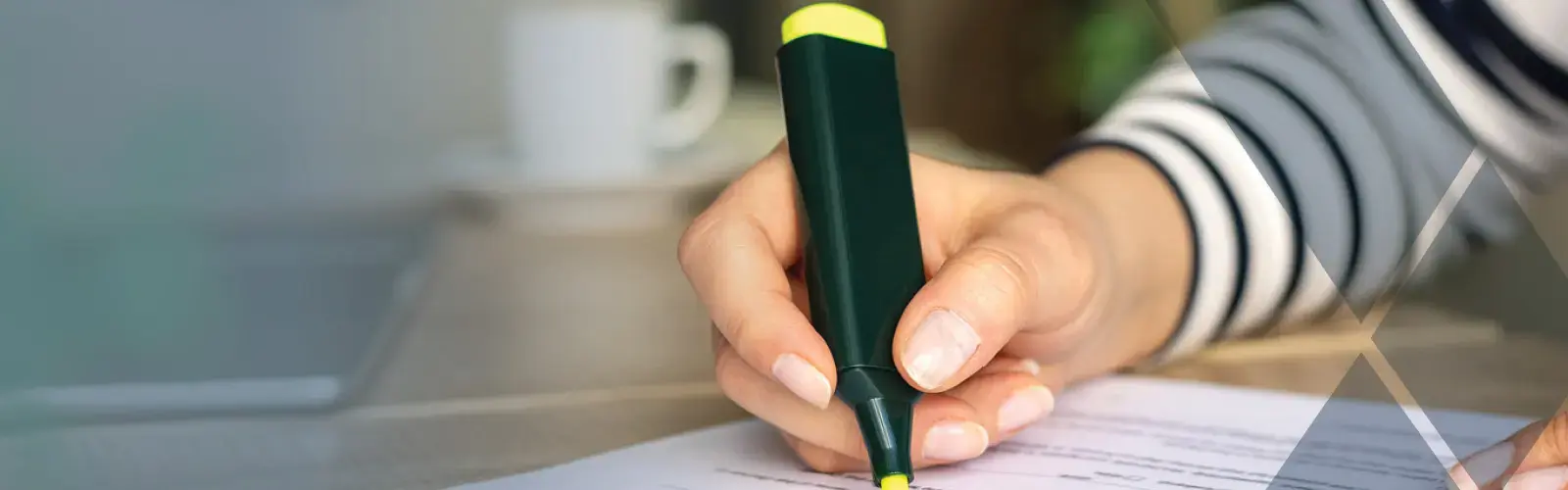 Closeup of a hand holding a highlighter