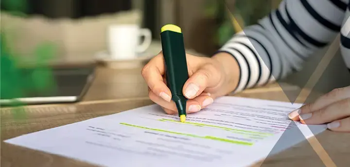 Closeup of a hand holding a highlighter